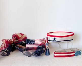 Patriotic americana themed decor - sheer american flag bow, wooden boat, sailor cap