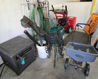 Hose reel, spreader, plant stands, tomato cages, tiller, street signs