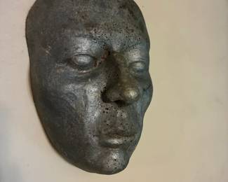 face sculpture by homeowner artist