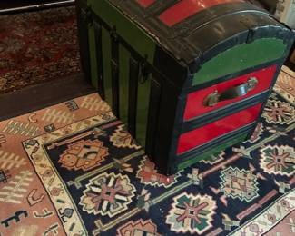 Baluch rug / antique wood trunk
