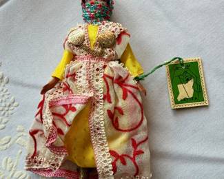vintage souvenir doll representing Moroccan folklore, identified on its tag as "Latifa“