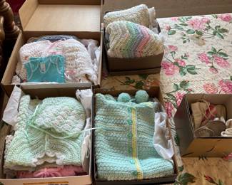 Hand made baby blankets, sweaters with booties and hats (super cute and soft!)