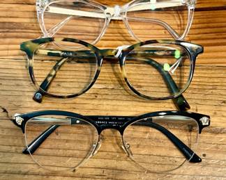Assortment of eyewear including  Prada and Versace