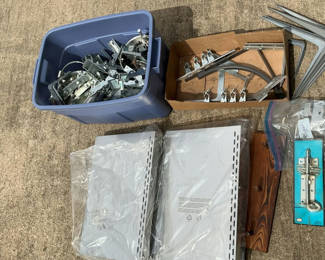 Lot 39: Assorted metal brackets, rails, hinges and mounting hardware