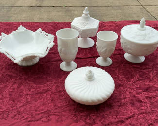 Lot 21: Milk glass tableware collection with lidded bowls, goblets, and a compote