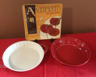 Lot 29: White fluted-edge pie dish, red round dish, and Antipasto di giorno sign