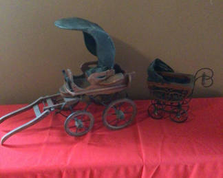 Lot 27: Antique doll carriages and prams