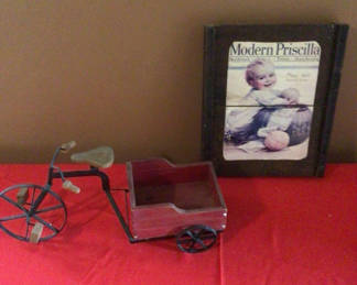 Lot 28: Vintage tricycle with wagon and framed magazine cover