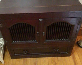 Lot 72: Dark wooden cabinet with slatted vented doors