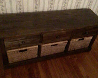 Lot 63: Dark wood storage cabinet with two drawers and two wicker baskets