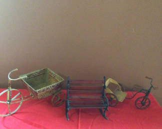 Lot 26: Vintage metal toy bicycles with carts and a small bench