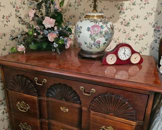 mahogany bachelors chest with a shell-carved block front.