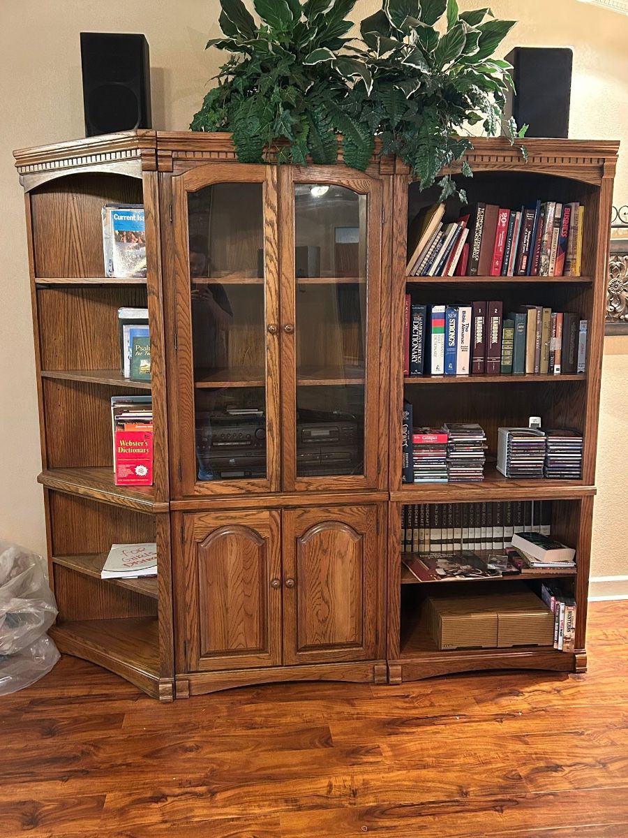 Bookcase / Cabinet  Excellent condition. All 3 pieces can be split to be used in different areas. Must be able to move and load yourself  Entire length measures: 81” 76” tall x 20” deep