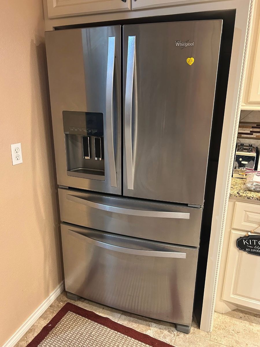 Whirlpool Stainless Refrigerator Excellent working condition  Must be able to move and load yourself