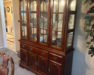 Lighted China Cabinet Excellent condition  Top and bottom are able to be separated. 58” across x 16” deep x 85” tall Must be able to move and load yourself