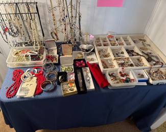 Table full of costume jewelry