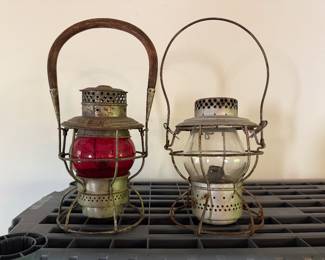 The Adams & Westlake Co. Rock Island Railroad Lantern with Red Glass and Wooden Handle Canada 1921-1923; Handlan Lantern St. Louis Railroad Lantern Clear Glass 
