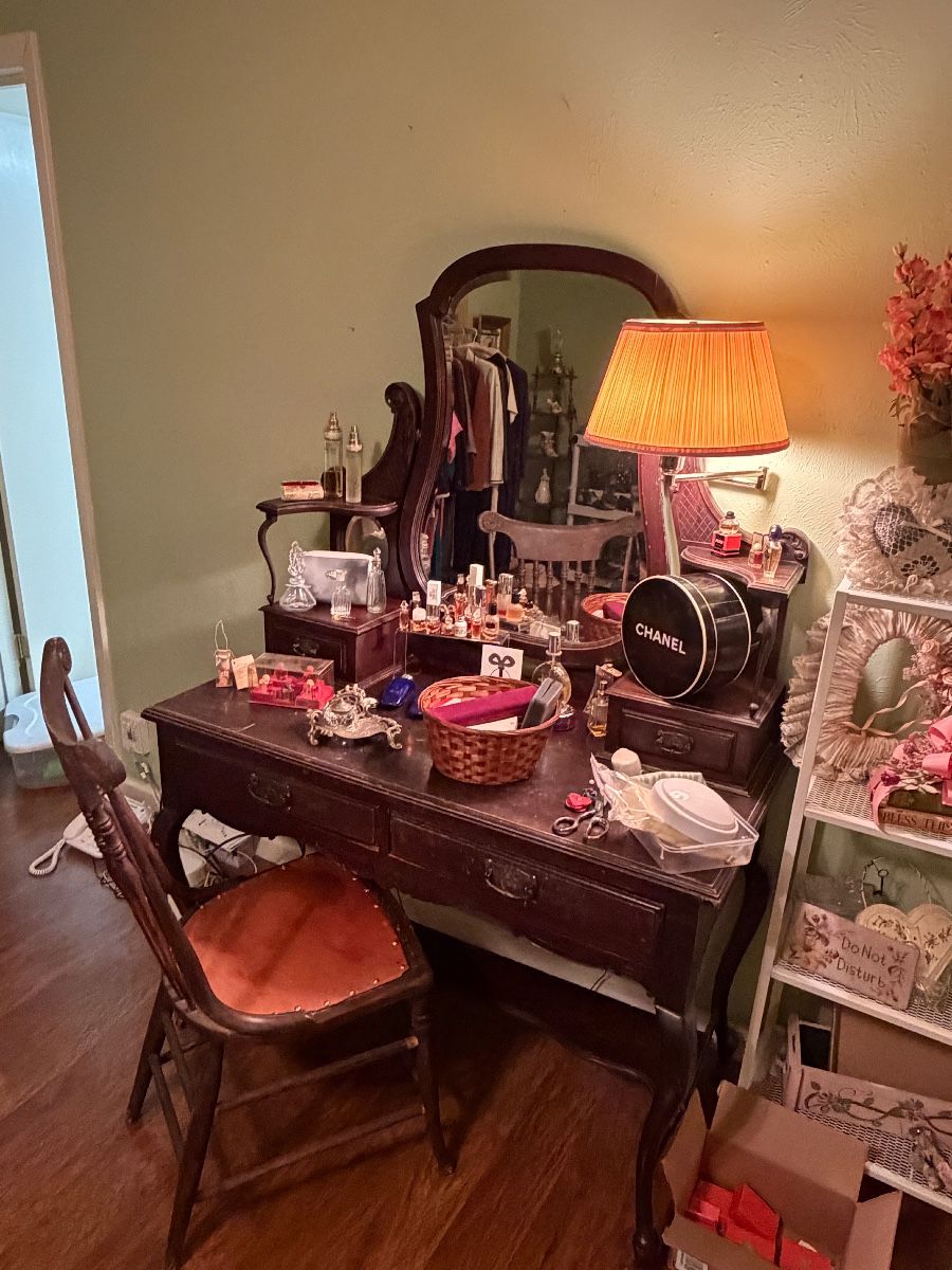 Vintage vanity with lots of vintage perfumes