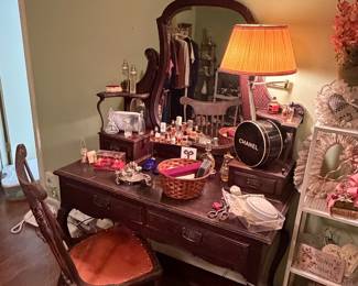 Vintage vanity with lots of vintage perfumes