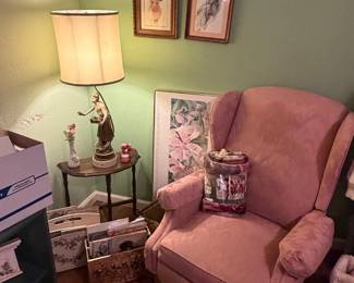 Antique lamp, antique Cosmopolitan magazines, wingback chair