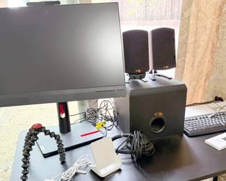 Computer desk with ThinkCentre monitor and Klipsch speakers + subwoofer
