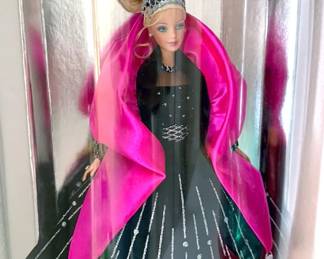 Barbies in boxes, including Winter Fantasy, Bob Mackie, Holidays, Millennium Princess