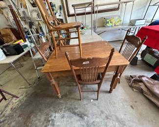 #81	Oak Table w/4 legs & 4 Chairs w/cane seats - 33x44x29	 $140.00 			