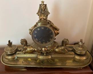 #209	brass double ink well with clock and Egyptian statues 15x10	 $159.00 			
