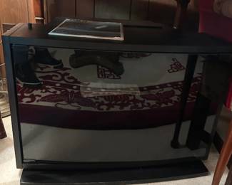 #29	Black TV Cabinet w/2 shelves and glass door - 27x19x18	 $20.00 			