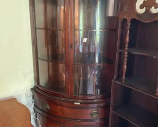 #112	Mahogany Corner Cabinet w/Rounded Front - 2 glass doors 2 wood doors and 1 drawer w/3 shelves total - 36x24x70	 $275.00 			