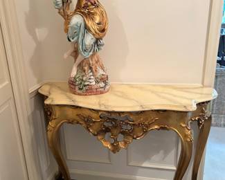 #212	cream painted table with fake Mable top painted 45x16x33	 $175.00 			