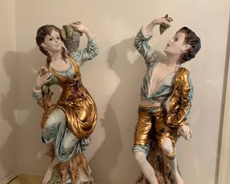 #213	pair of a couple vintage ceramic statues holding grapes 34 tall	 $200.00 			