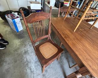 #81	Oak Table w/4 legs & 4 Chairs w/cane seats - 33x44x29	 $140.00 			