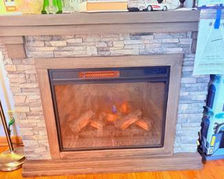 Broyhill electric fireplace with remote and instructions. 