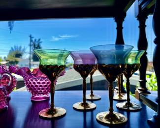 Lots of lovely colored glass to include a good deal of Fenton Hobnail.
