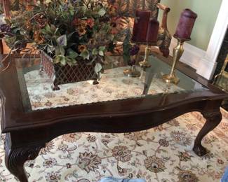 Mahogany Bevelled glass carved coffee table, extremely heavy and well made $350