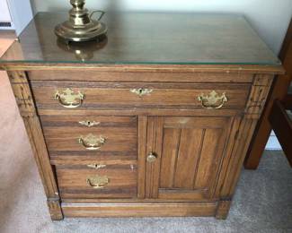 Antique bedside oak table 3 drawers and 1 cabinet $185