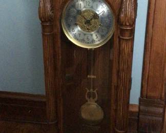 New unused oak pendulum chiming clock. Still has cardboard around the chimes.  Stands appropriately 32”. Can be hung on wall  $495