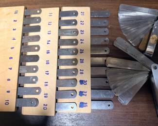 Feeler gauges, also known as thickness gauges