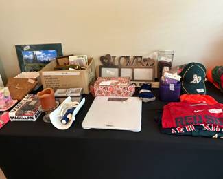 2nd bedroom - shirts, hats, various decor items