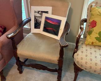 Pictures in second chair, another chair with pillow