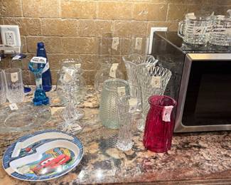 Kitchen -?flower vases - candle holders - microwave (Hamilton Beach) to right