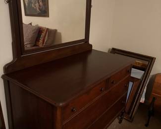 Dresser with large framed mirror
