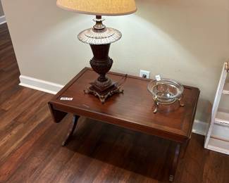 Coffee table, lamp, glass bowl in metal stand
