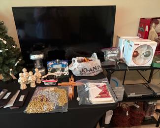tv, beads, cross, Christmas items electronics, smslll lamp shades, plastic items