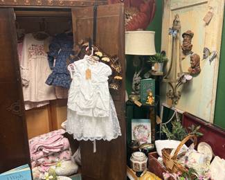 children's clothing, basket, bundt pan, table