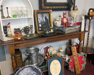 silverplate tray, framed wall mirror, decorative shelf, plant stand