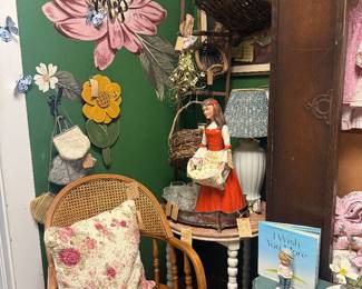 figurines, vintage chair, baskets, books