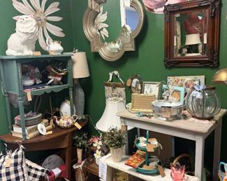 mirror, cat figurines, wall art, shelves