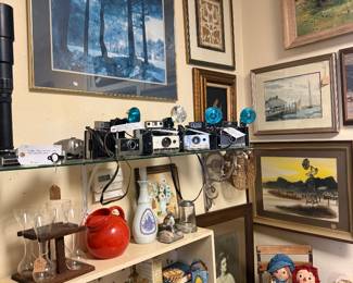 toys, framed art, vintage camera collection, oil paintings